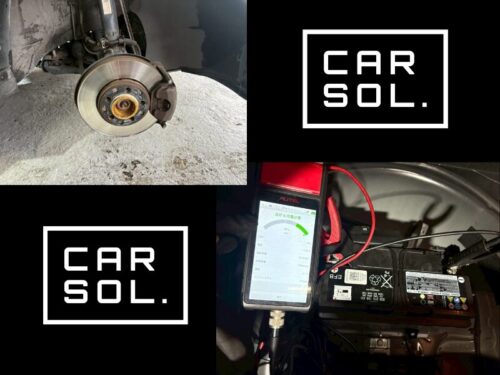 アウディ車両の車検見積り時に、フロントブレーキの摩耗点検と専用テスターによるバッテリー診断を実施している様子。安全に関わる重要項目を細かくチェックしている作業風景。