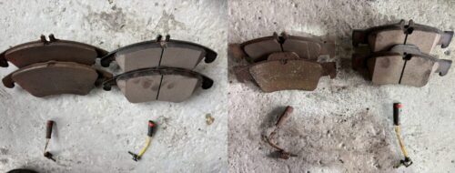 メルセデスベンツEクラスのブレーキパッドを取り外して並べた状態。 摩耗した使用済みブレーキパッドと、新品（または残量のある）ブレーキパッドを比較でき、あわせてブレーキパッドセンサーも確認できる画像。