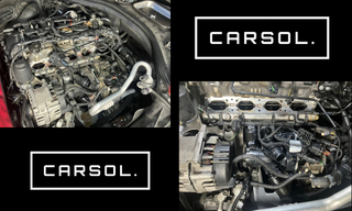 アウディA7のエンジン周辺を分解して点検している様子。インテーク周りや冷却系統の部品が見える状態で、クーラント乳化トラブルの原因確認や修理作業中のエンジンルームの様子とCARSOL.ロゴを組み合わせた整備作業紹介用画像。