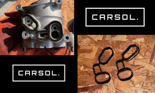 オイルハウジング本体と取り外したガスケット部品を並べた写真（劣化状態が分かる構成）