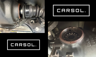 BMW 1シリーズのリアディファレンシャル周辺。ドライブシャフト付け根部分と、取り外したディファレンシャルサイドシールの状態を確認できる整備写真。