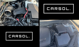 ボルボV40のエンジンルームを点検している様子。ABSユニットや電装系統の状態を確認している整備作業の写真。