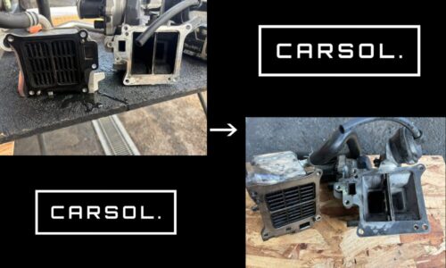 ボルボV60のEGRクーラーおよびEGR通路を取り外した状態の写真。左側は取り外した直後の状態で煤（すす）が付着している様子、右側は清掃後の状態で内部通路がきれいになっていることが分かる整備比較写真。