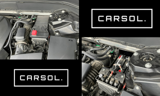 ボルボXC90のエンジンルーム内にあるメインバッテリーおよびサブバッテリー周辺の状態（交換前の確認・点検状況が分かる写真）